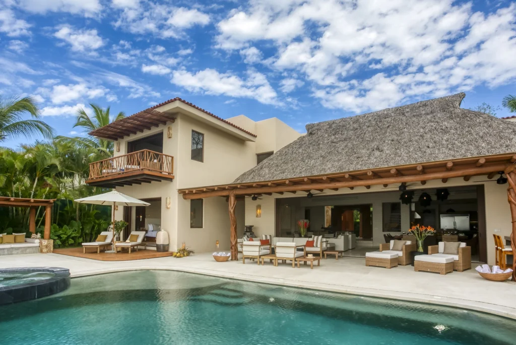 Casa Dewi swimming pool facing the covered lounge, open living areas and private balcony